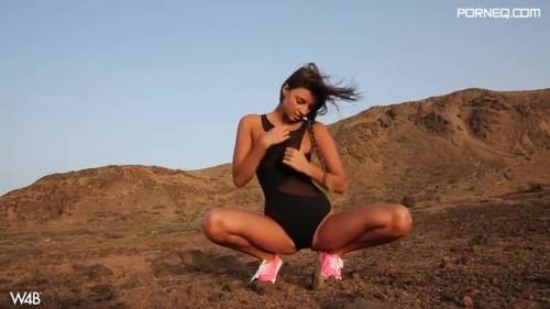 Stunning Maria Rya fingers her cooch in a rocky desert - new.porneq.com on ipornview.com