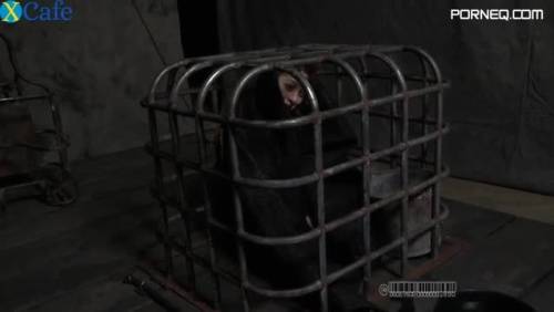 Ruined red haired MILF gets locked in metal cage showing off her tits - new.porneq.com on ipornview.com